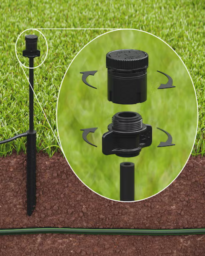 Garden irrigation system Rainbird SQ Series Square Pattern Nozzles with a close-up of the sprinkler head on grass.